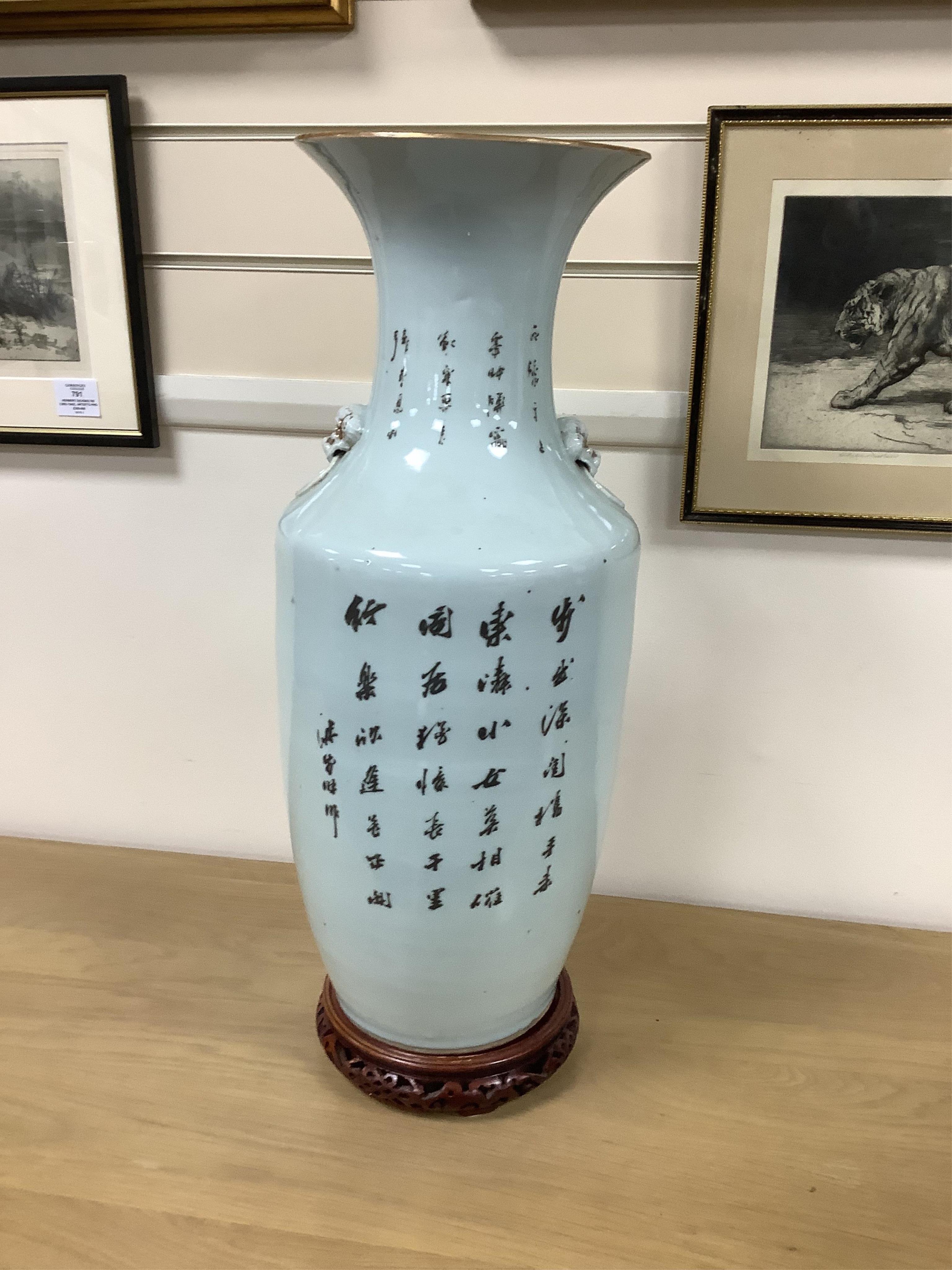 An early 20th century Chinese famille rose vase on stand. 57cm high. Condition - good